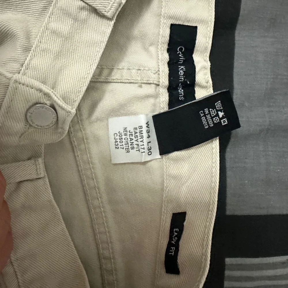 Calvin Klein Jeans Mens 34x32 Easy Fit New Oyster Cotton Denim